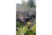 Anthrazitfarbene Gartenpergola mit Vorhängen La Palma 3x4 Garden Point